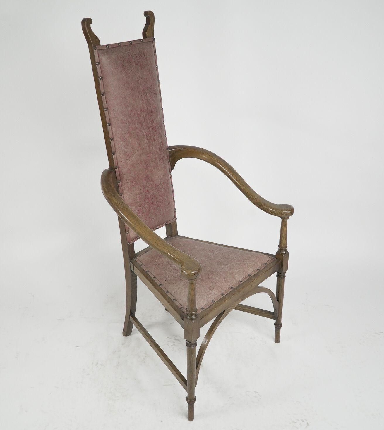 J S Henry. An Ash Arts & Crafts Armchair With An Elongated Back & Curled Ears photo for sale