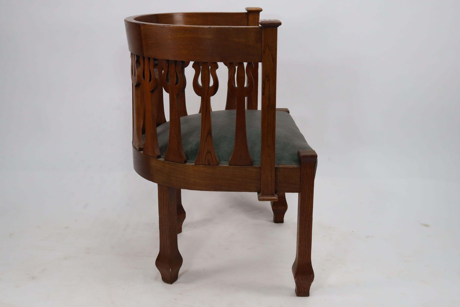 An Arts And Crafts Oak Armchair With Stylized Floral Upright Decoration photo vinterior