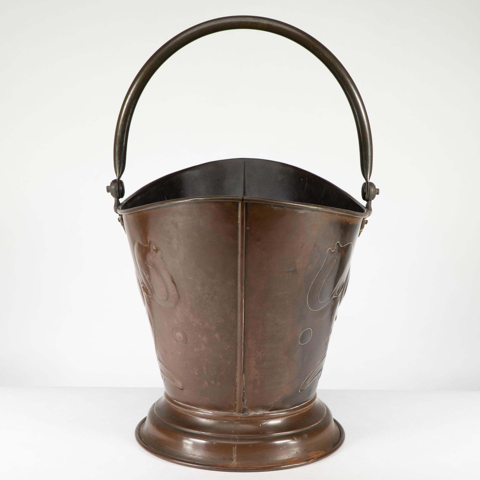 photo furniture An Arts & Crafts Copper Coal Bucket With Floral Decoration And Chocolate Patina