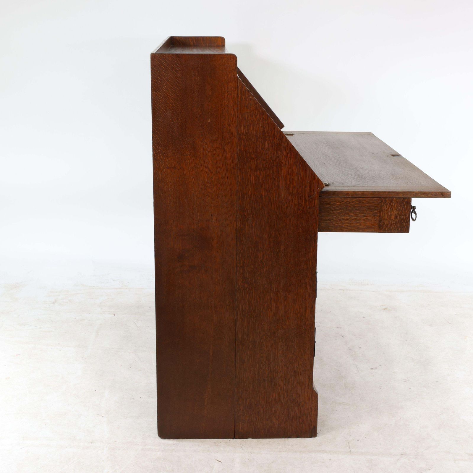 photo furniture Leonard Wyburd For Liberty & Co. An Arts & Crafts Oak Bureau With Iron Hinges