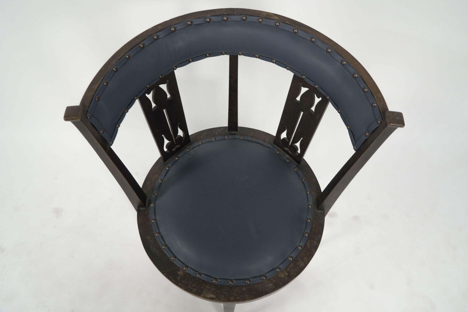 Furniture An Arts And Crafts Mahogany Tub Chair With Stylized Floral Cut Outs photo