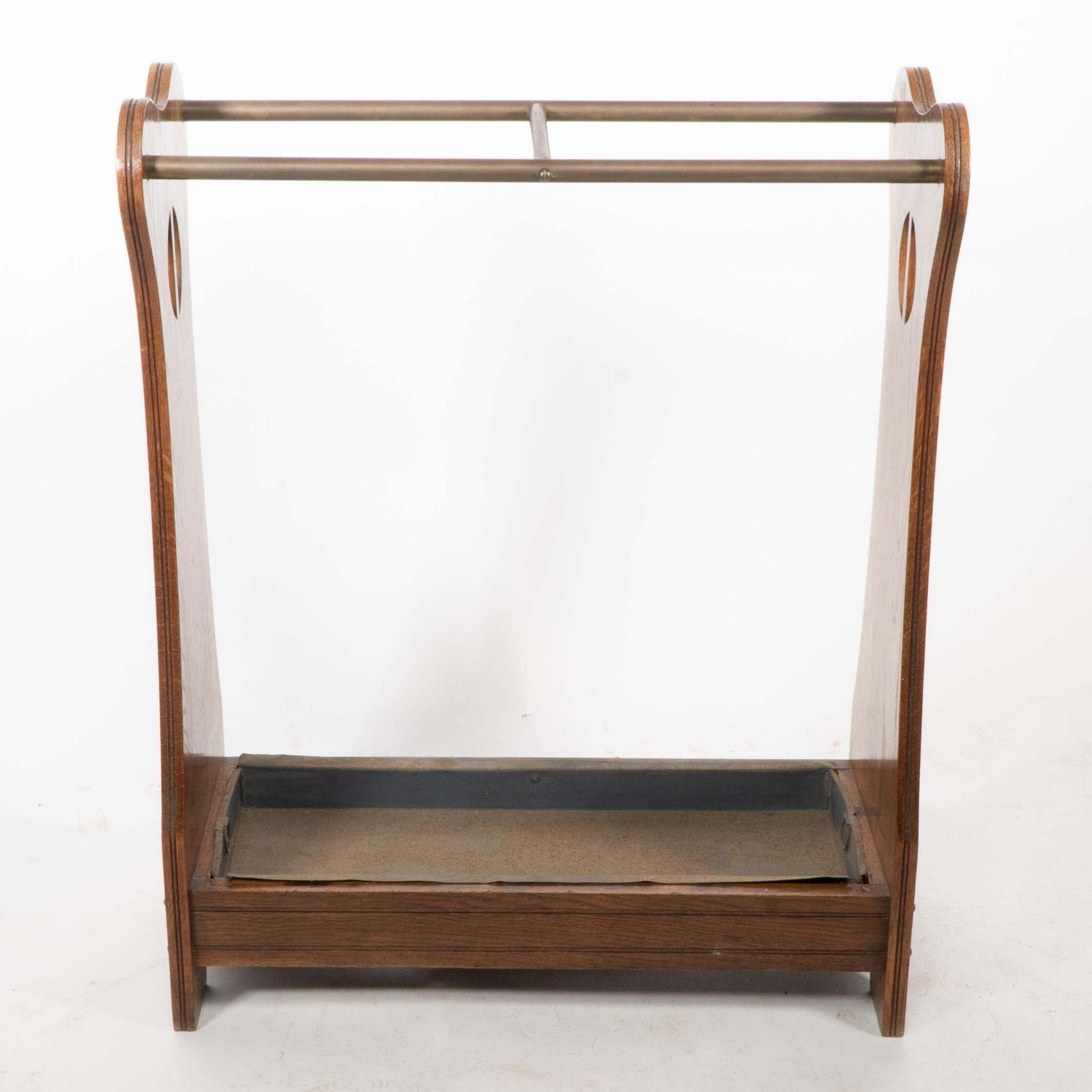 An Arts And Crafts Oak Umbrella And Walking Stick Stand photo 561.0