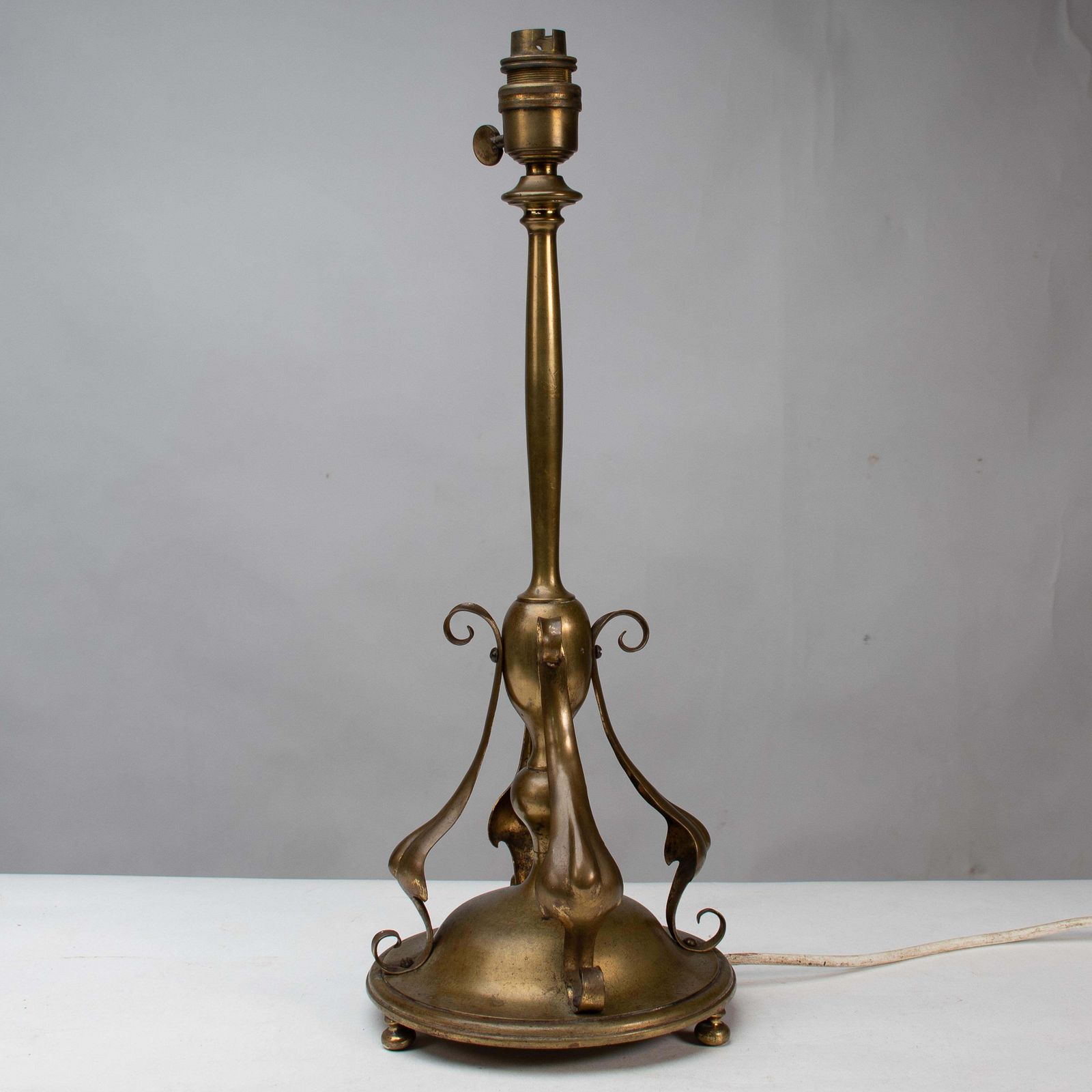 An Arts And Crafts Brass Table Lamp In The Style Of C F A Voysey photo vinterior