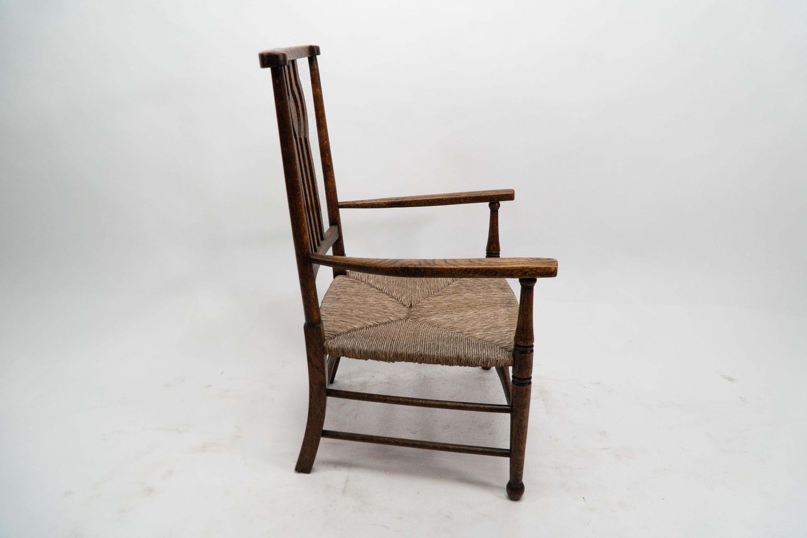 Liberty And Co. An Arts And Crafts Rush Seat Armchair photo for sale