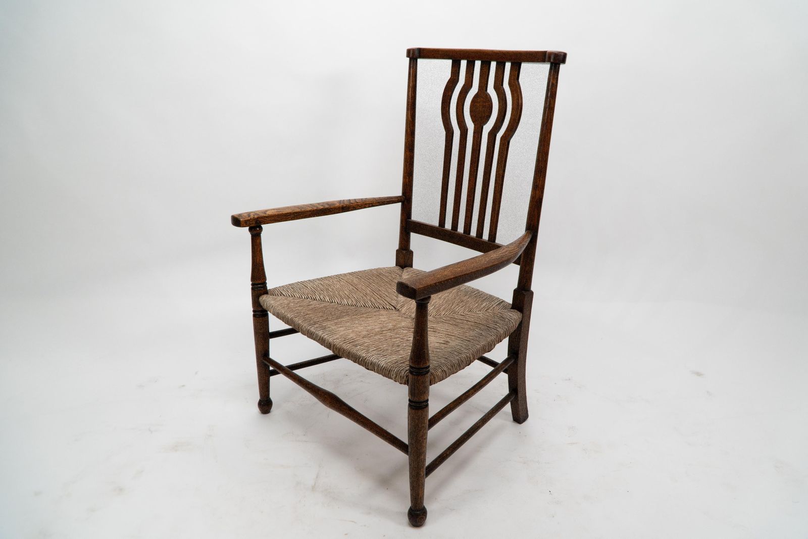 Liberty And Co. An Arts And Crafts Rush Seat Armchair photo 663.0