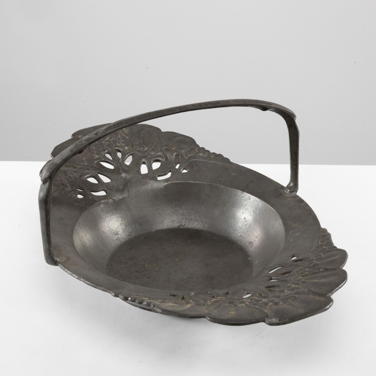 Urania. An Art Nouveau Pewter Fruit Bowl With A Loop Handle Floral Decoration photo furniture