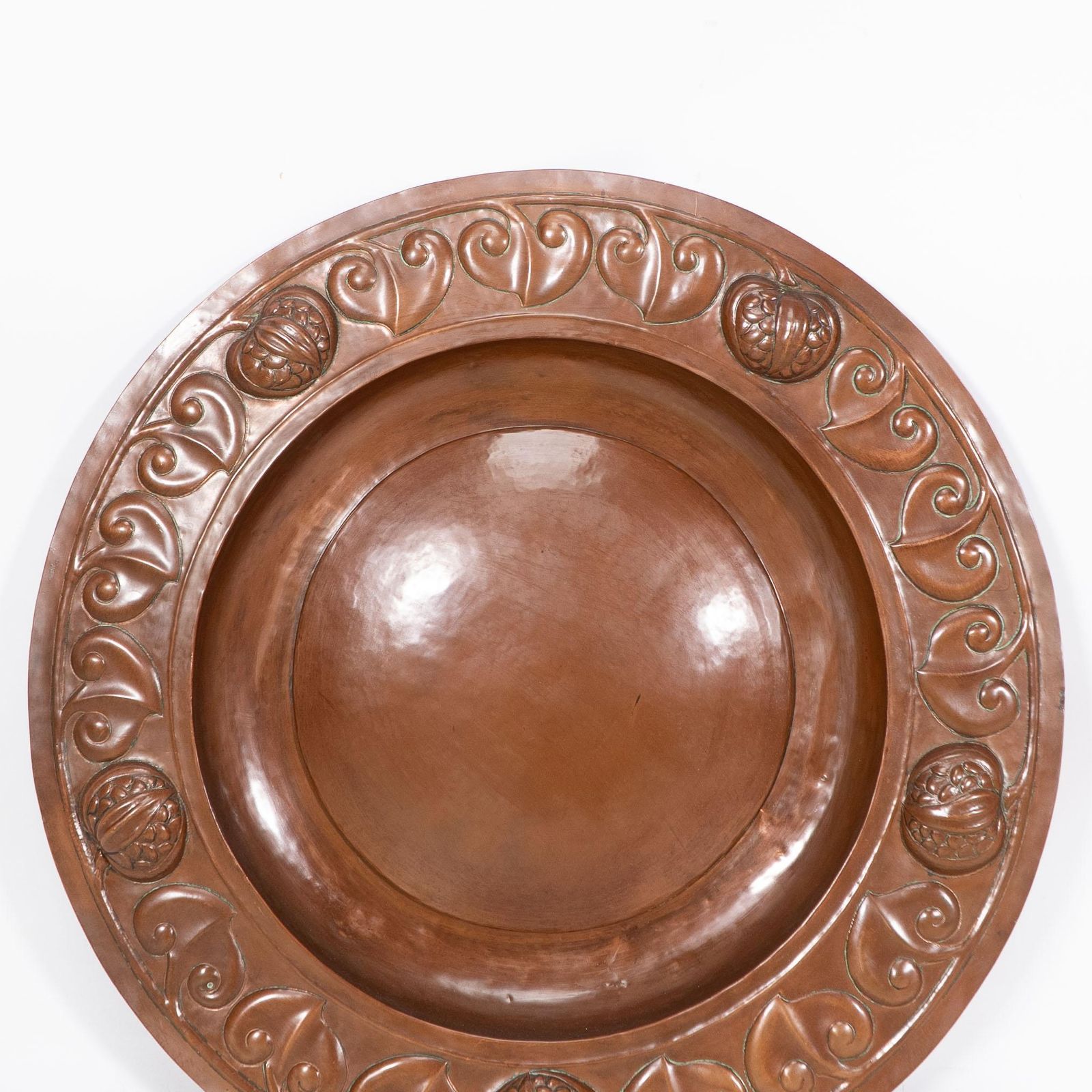 A Large Arts And Crafts Hand Formed Copper Charger With Stylized Decoration photo vinterior
