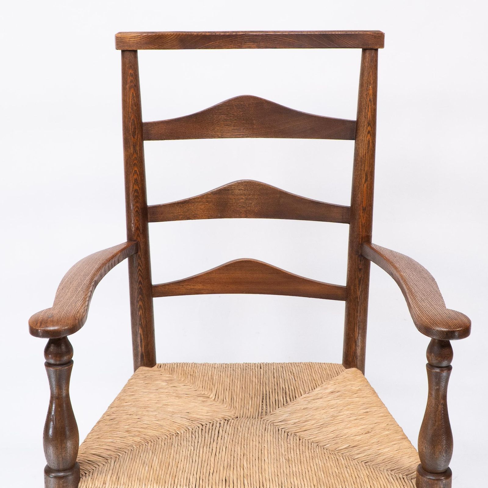 C R Ashbee Attr. An Arts & Crafts Oak Ladder Back Armchair With Re Rushed Seat photo vinterior