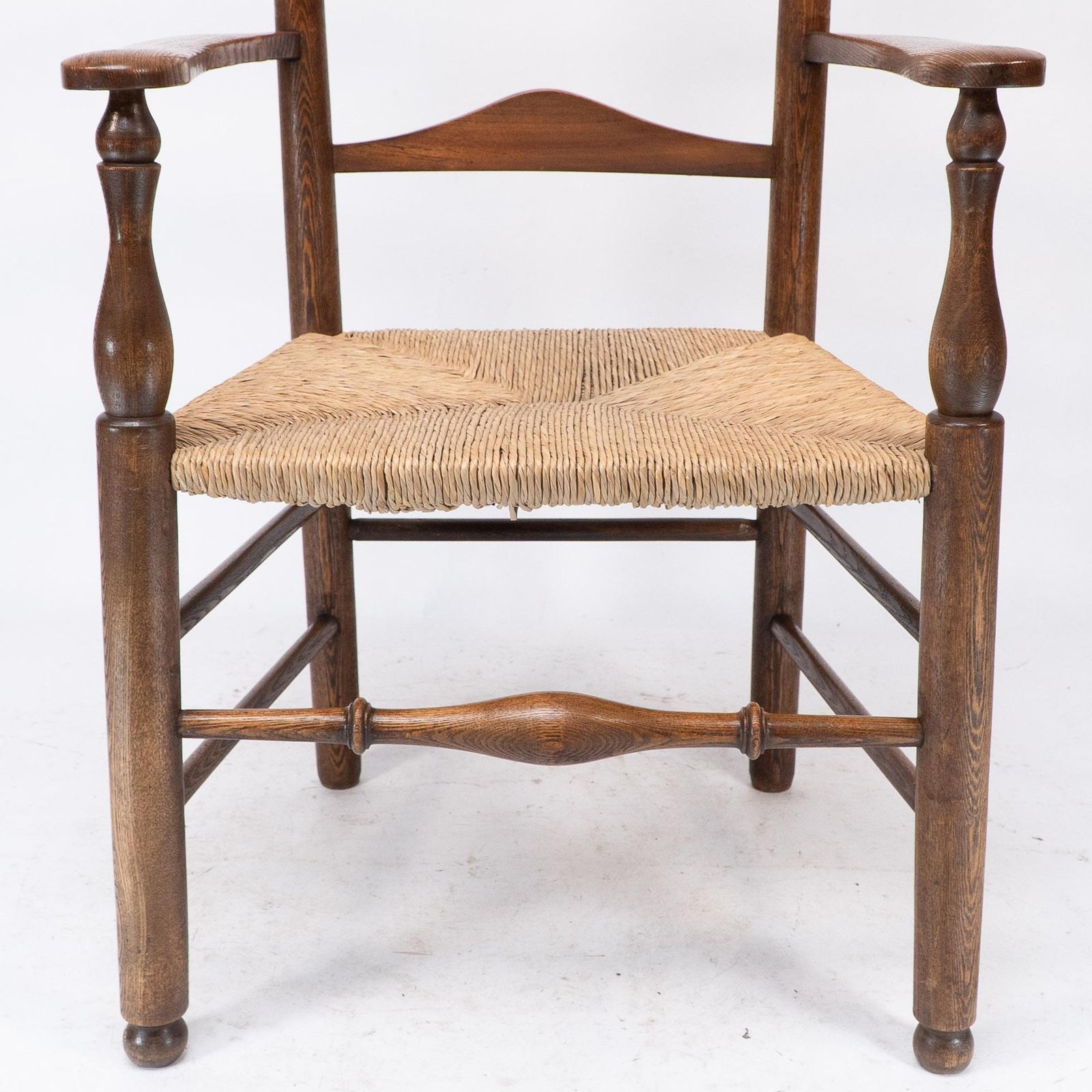 photo vinterior C R Ashbee Attr. An Arts & Crafts Oak Ladder Back Armchair With Re Rushed Seat