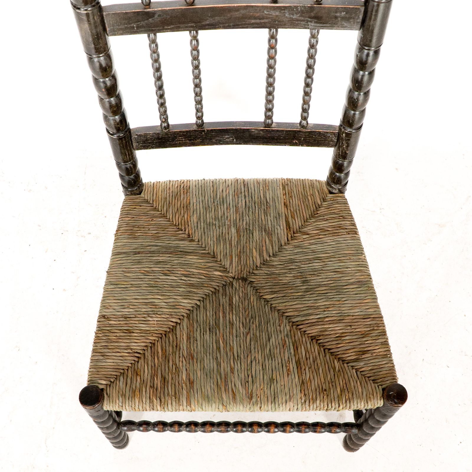 photo for sale Ernest Gimson. A Rare Cotswold School Ebonised Bobbin Turned Rush Seat Low Chair