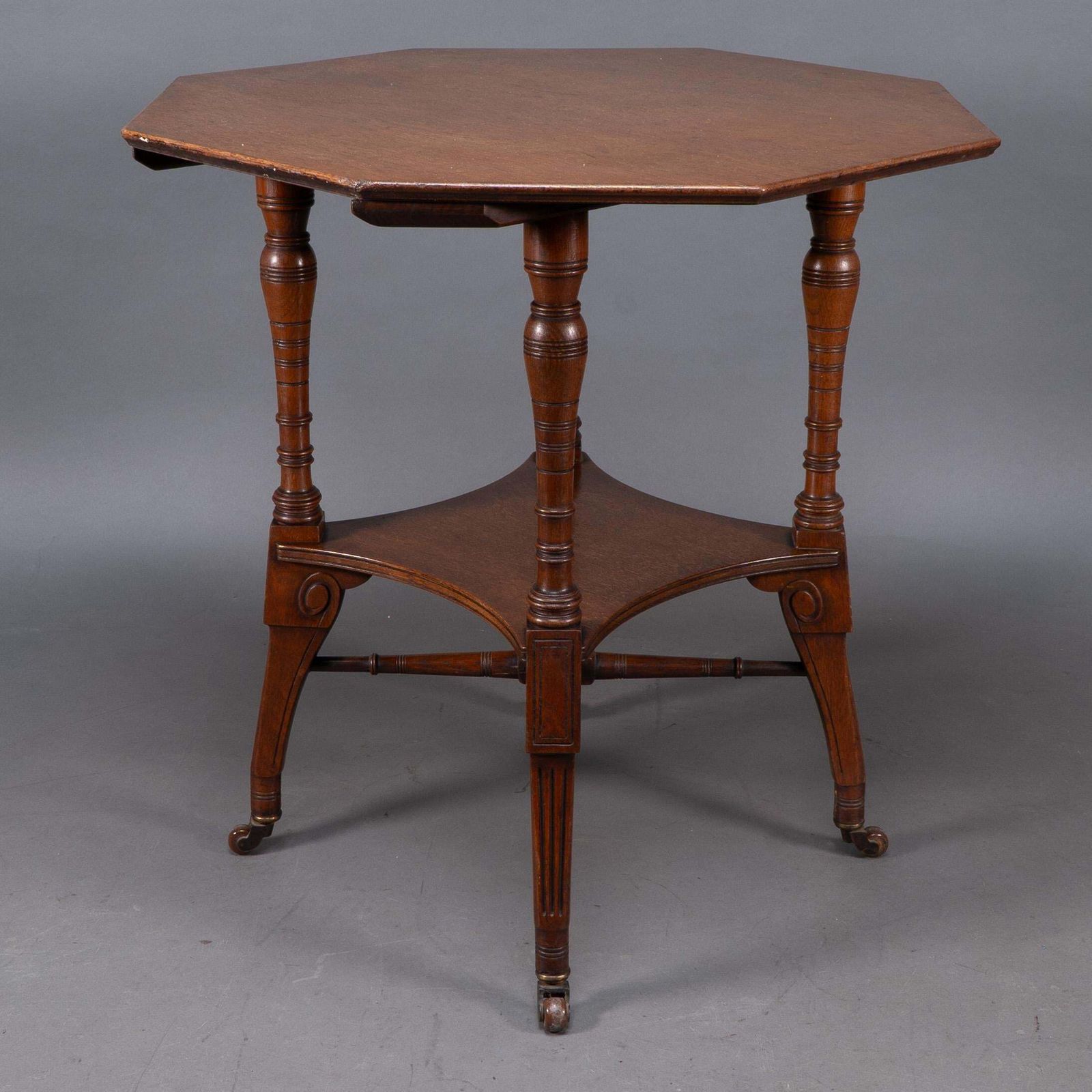 Jas Shoolbred. An Aesthetic Movement Walnut Octagonal Center Table photo for sale