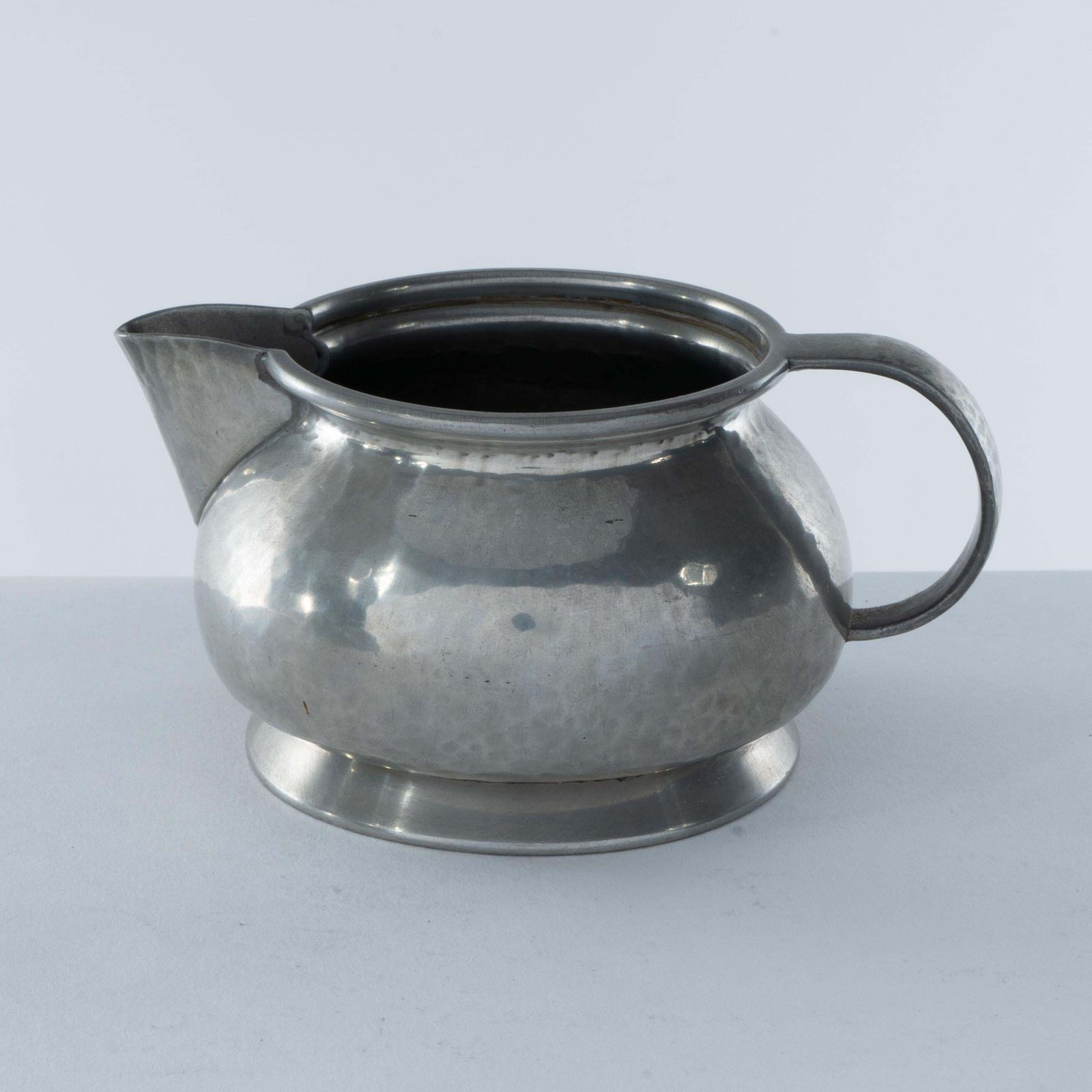 photo furniture Liberty And Co. An Arts And Crafts Six Piece Pewter Tudric Tea Set