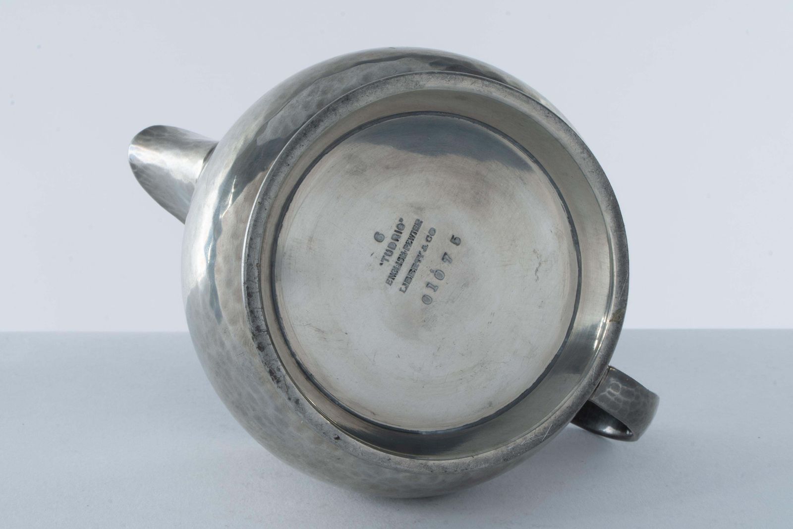 1836.0 Liberty And Co. An Arts And Crafts Six Piece Pewter Tudric Tea Set photo