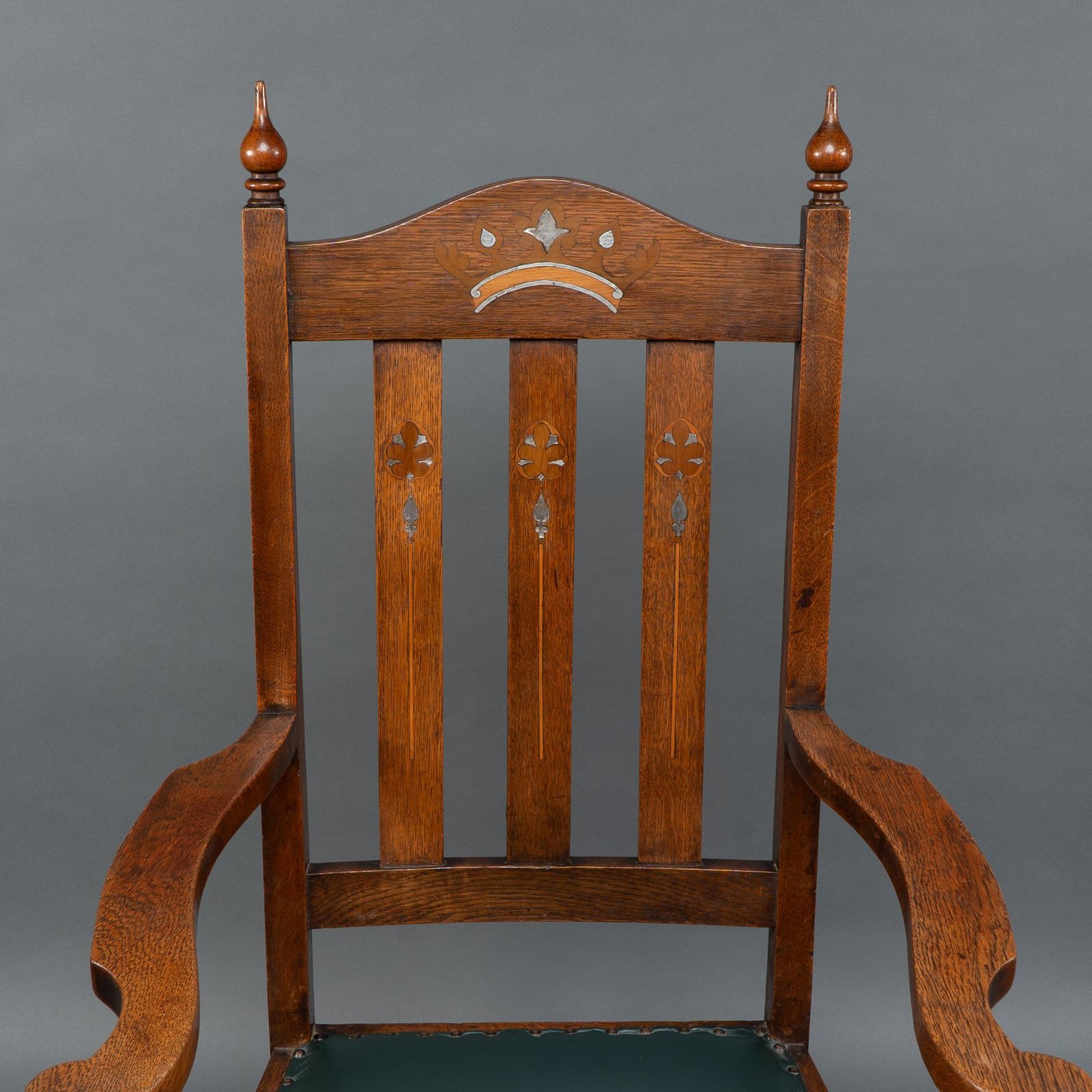photo furniture Liberty & Co Attributed. An Arts & Crafts Oak Armchair With Inlaid Royal Crown