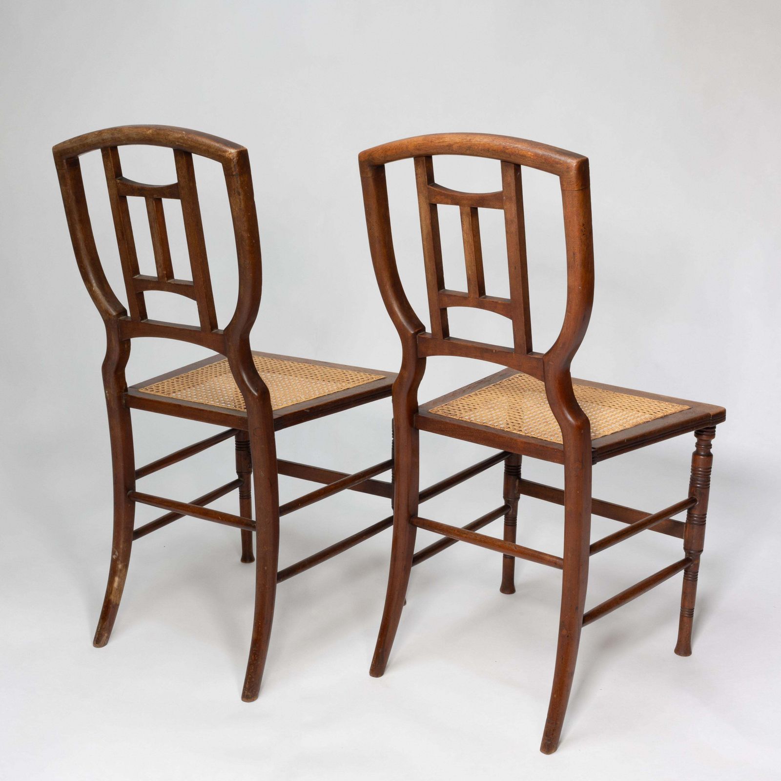 H W Batley Attr. Jas Shoolbred Pair Of Aesthetic Movement Cane Seat Beech Chairs photo for sale