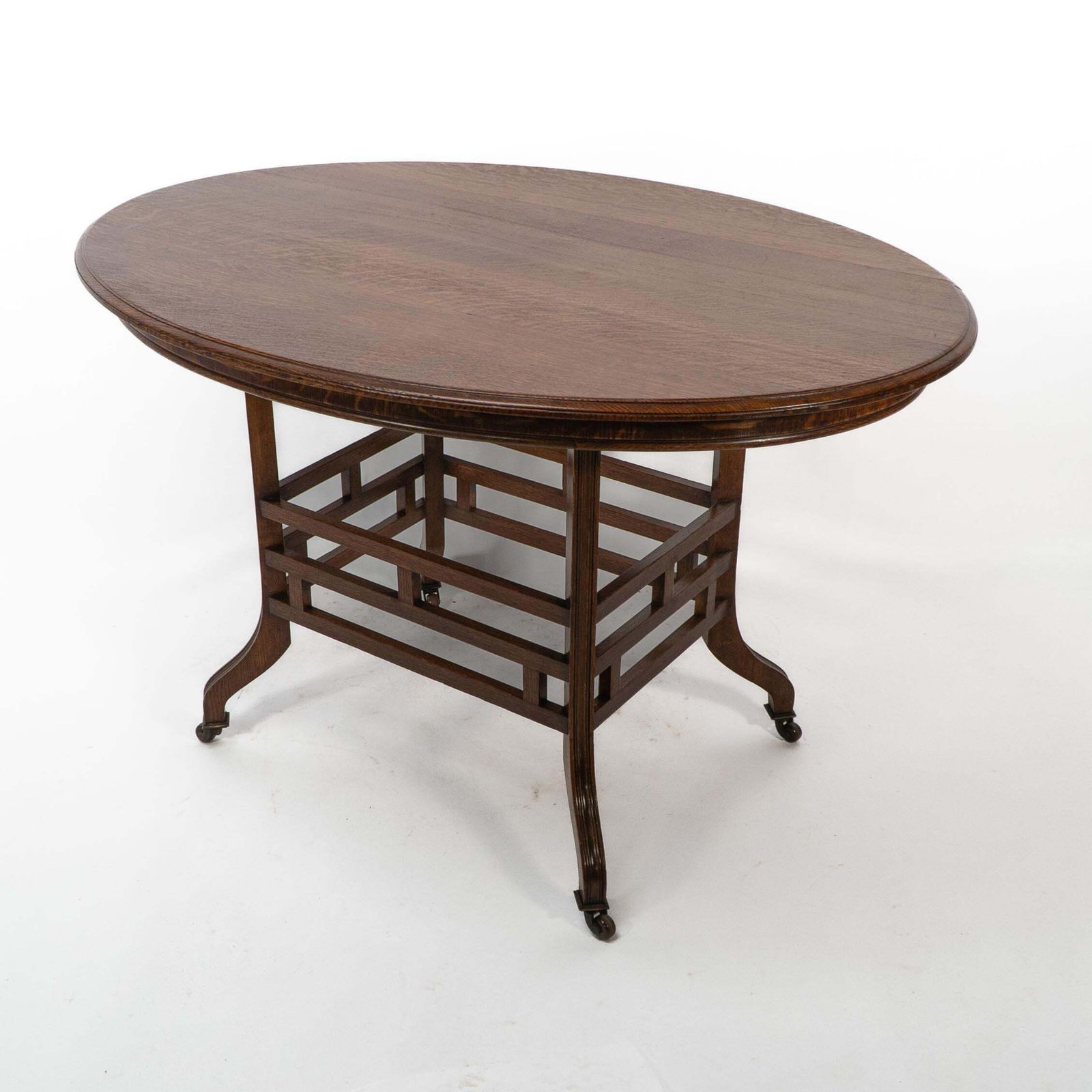 Lambs Of Manchester, Stamped Lambs. A Rare Anglo Japanese Oak Oval Centre Table photo vinterior