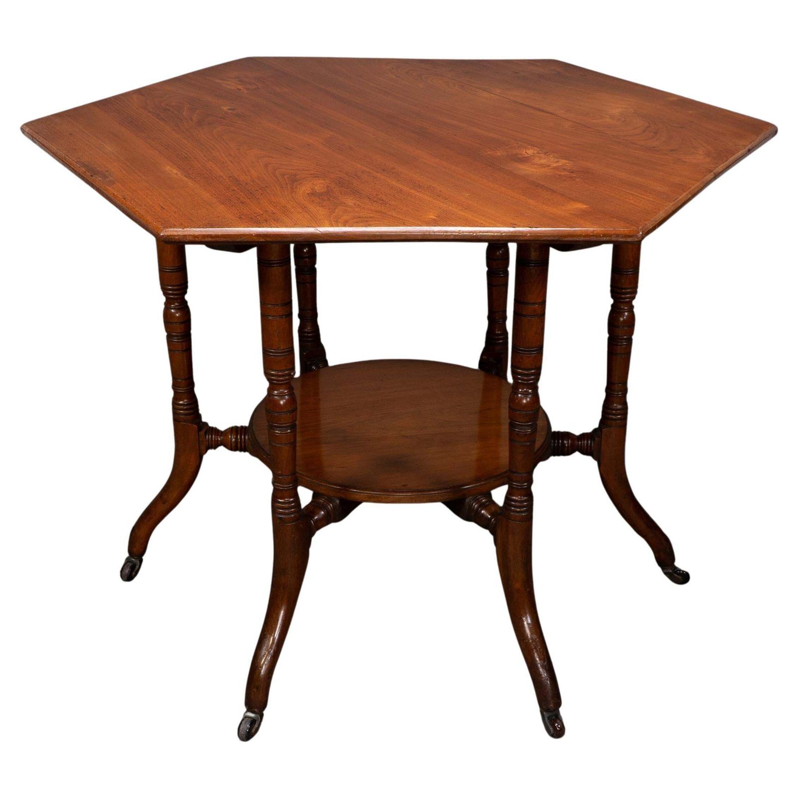 Collinson & Lock Attributed. An Aesthetic Movement Walnut Octagonal Center Table
