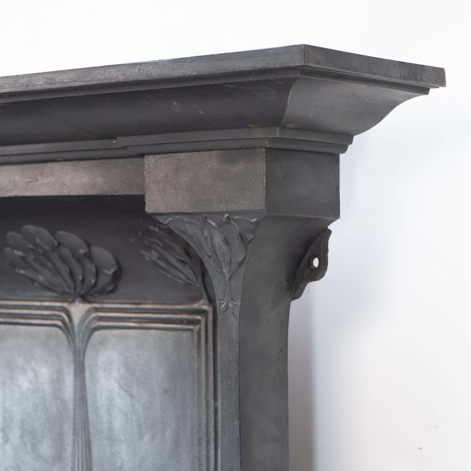 Arts & Crafts Cast Iron Fireplace With Curved Sides & Stylized Floral Decoration photo Home Fixtures