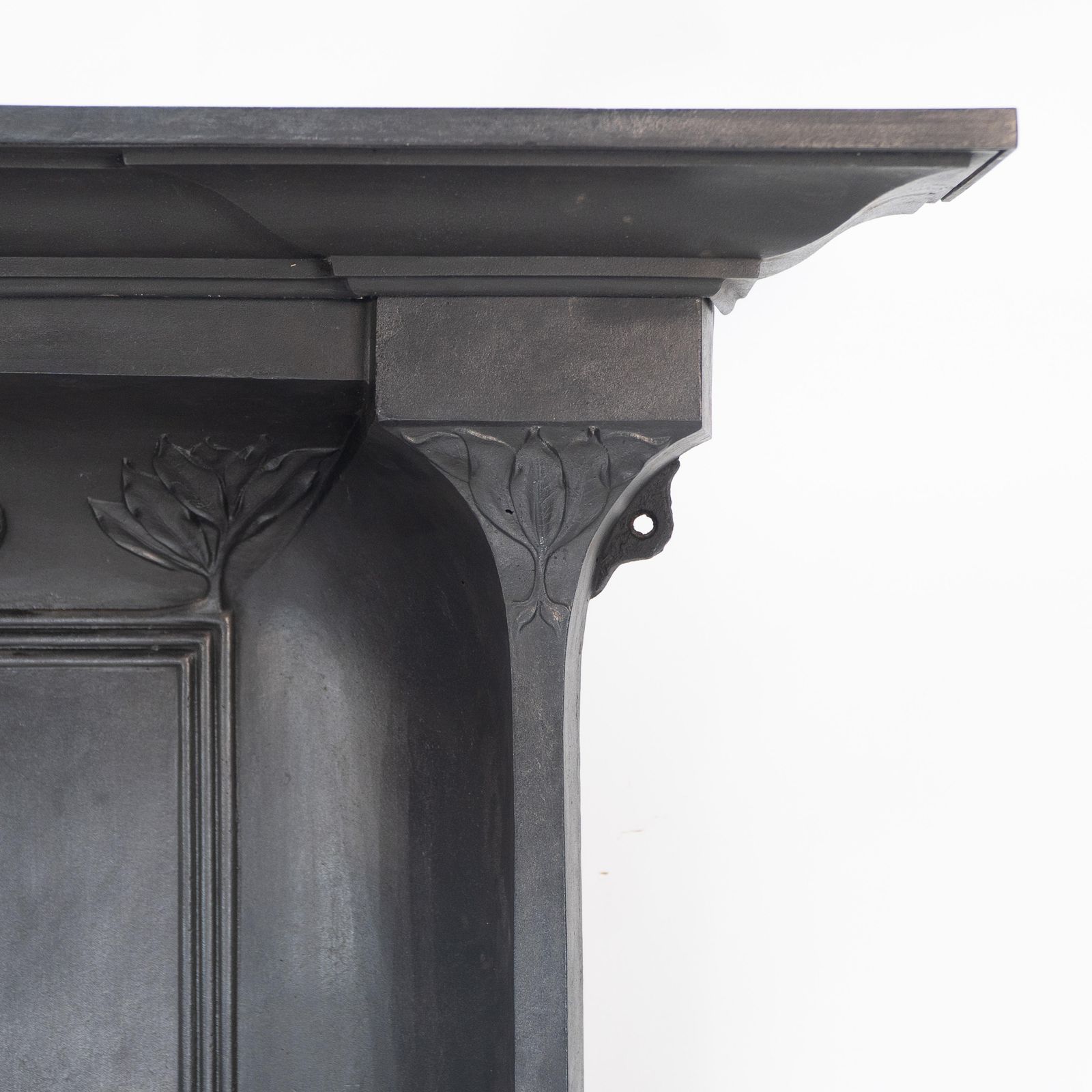 Arts & Crafts Cast Iron Fireplace With Curved Sides & Stylized Floral Decoration photo 2855.0