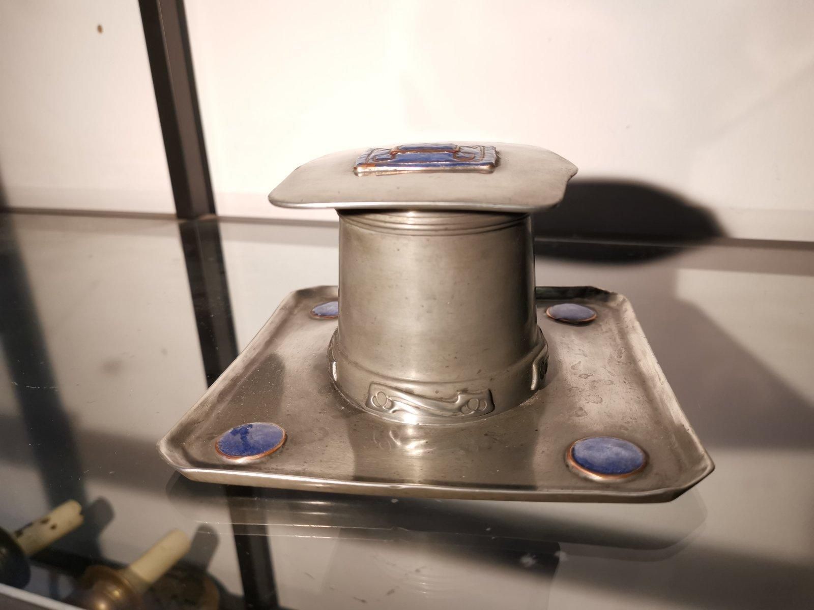 Liberty & Co. An Arts & Crafts Pewter Inkwell With Violet Enamel Decoration. photo for sale