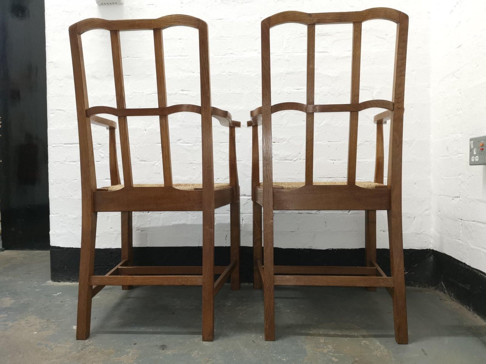Pair Of Cotswold School Arts & Crafts Oak Lattice Back Armchairs With Rush Seats photo vinterior