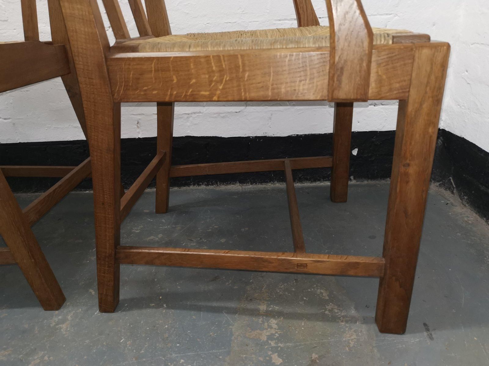 photo buy Pair Of Cotswold School Arts & Crafts Oak Lattice Back Armchairs With Rush Seats