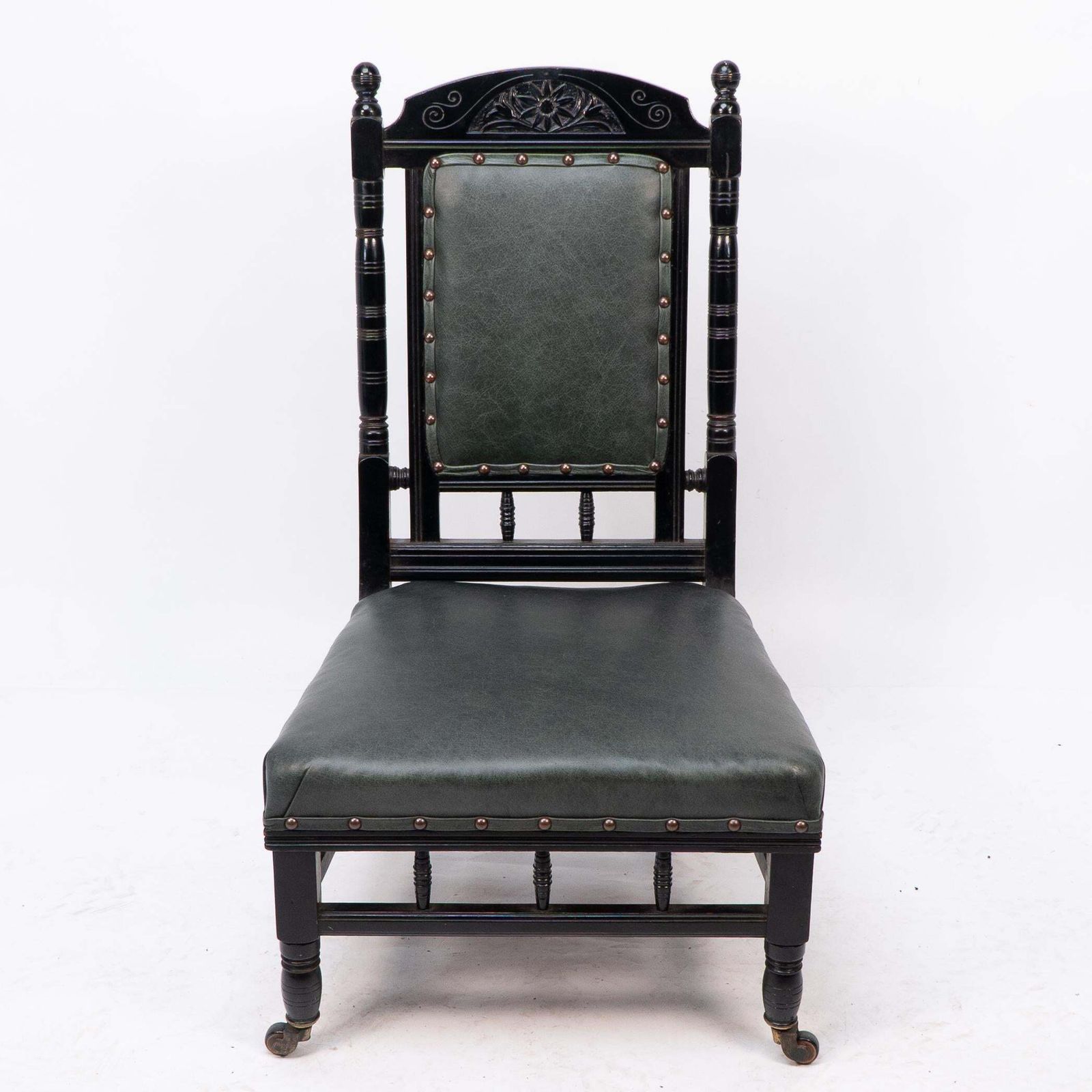 Gregory & Co. An Aesthetic Movement Nursing Chair With Stylized Carved Sunflower photo furniture