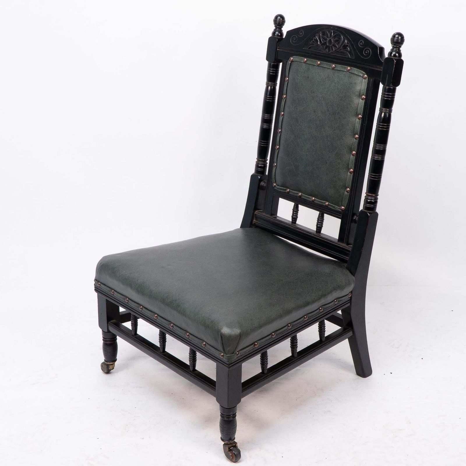 Gregory & Co. An Aesthetic Movement Nursing Chair With Stylized Carved Sunflower photo for sale
