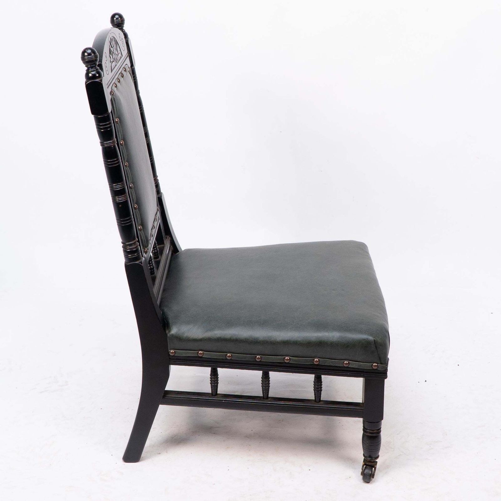 Gregory & Co. An Aesthetic Movement Nursing Chair With Stylized Carved Sunflower photo 1836.0