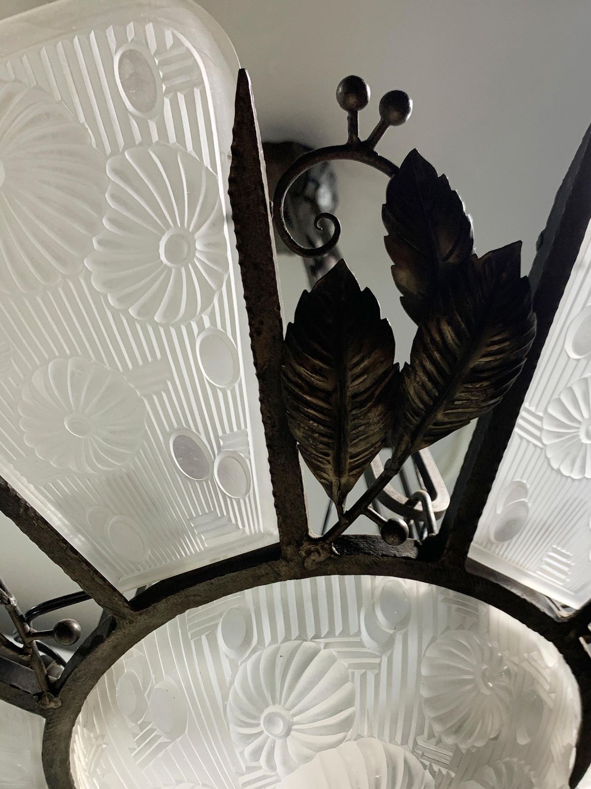 Lighting French Art Deco Chandelier In Wrought Iron And Press Molded Glass, Circa 1930's photo