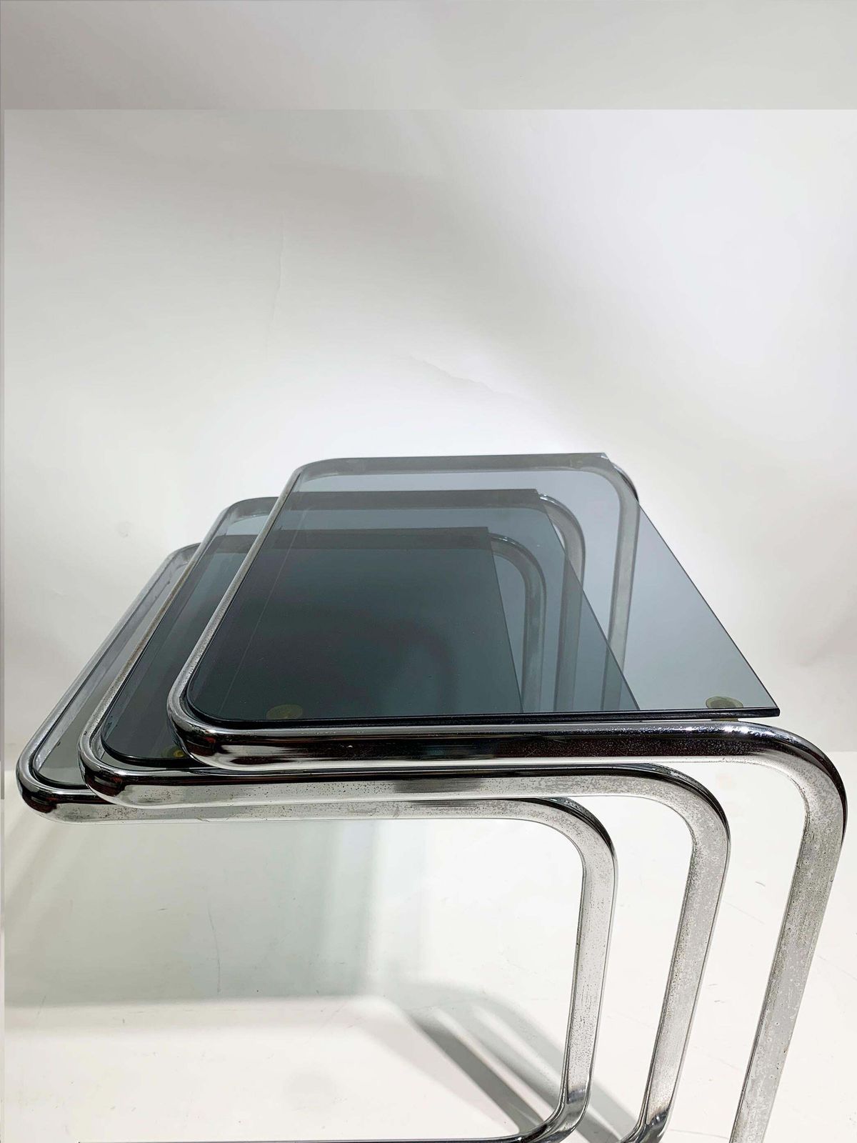 photo buy Set Of 3 Late 20th Century Nesting Side Tables In Chrome And Smoked Glass