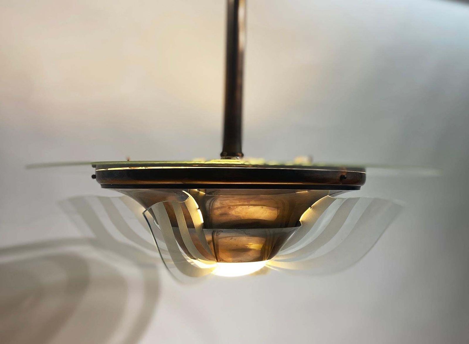 photo for sale 1930s French Art Deco Modernist Brass And Glass Chandelier By Petitot