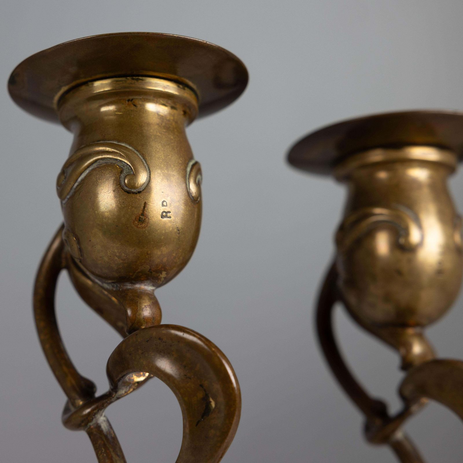photo furniture A Pair Of English Art Nouveau Candlesticks With Flowing Organic Decor