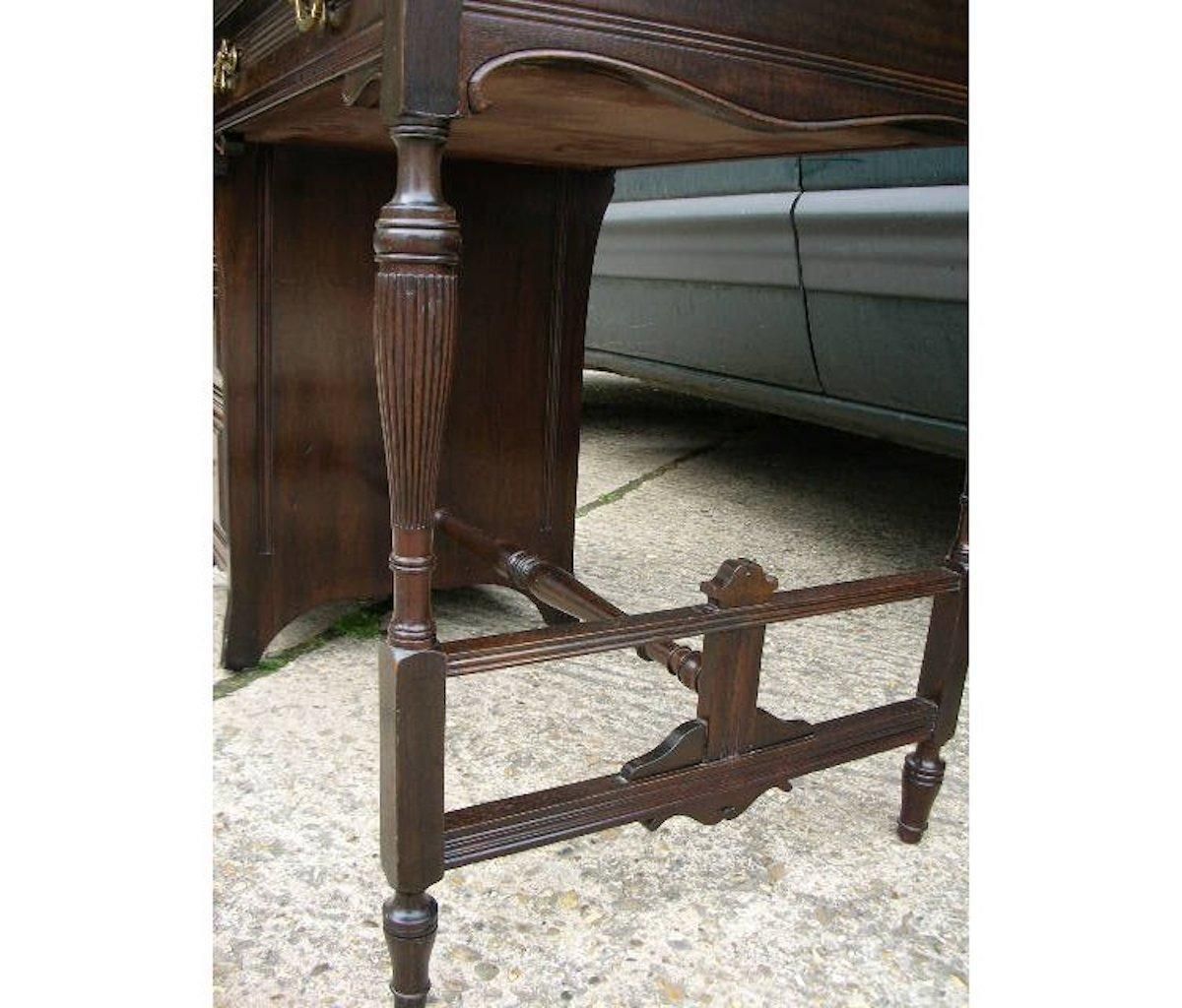 photo for sale Lamb Of Manchester, An Aesthetic Movement Walnut Writing Desk.