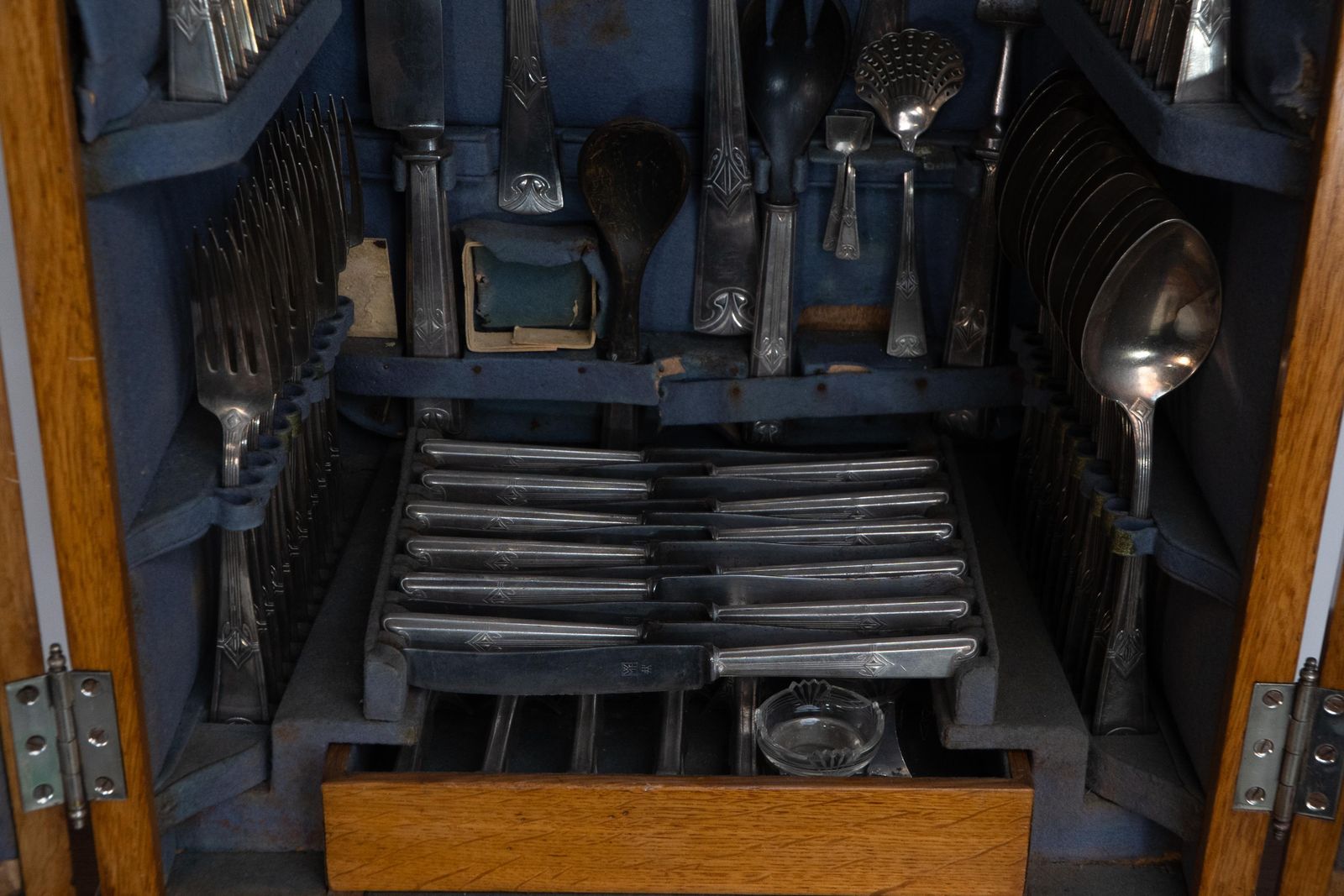 photo furniture Wmf. A 12 Person Cutlery Service In Original Stylized Secessionist Oak Cabinet