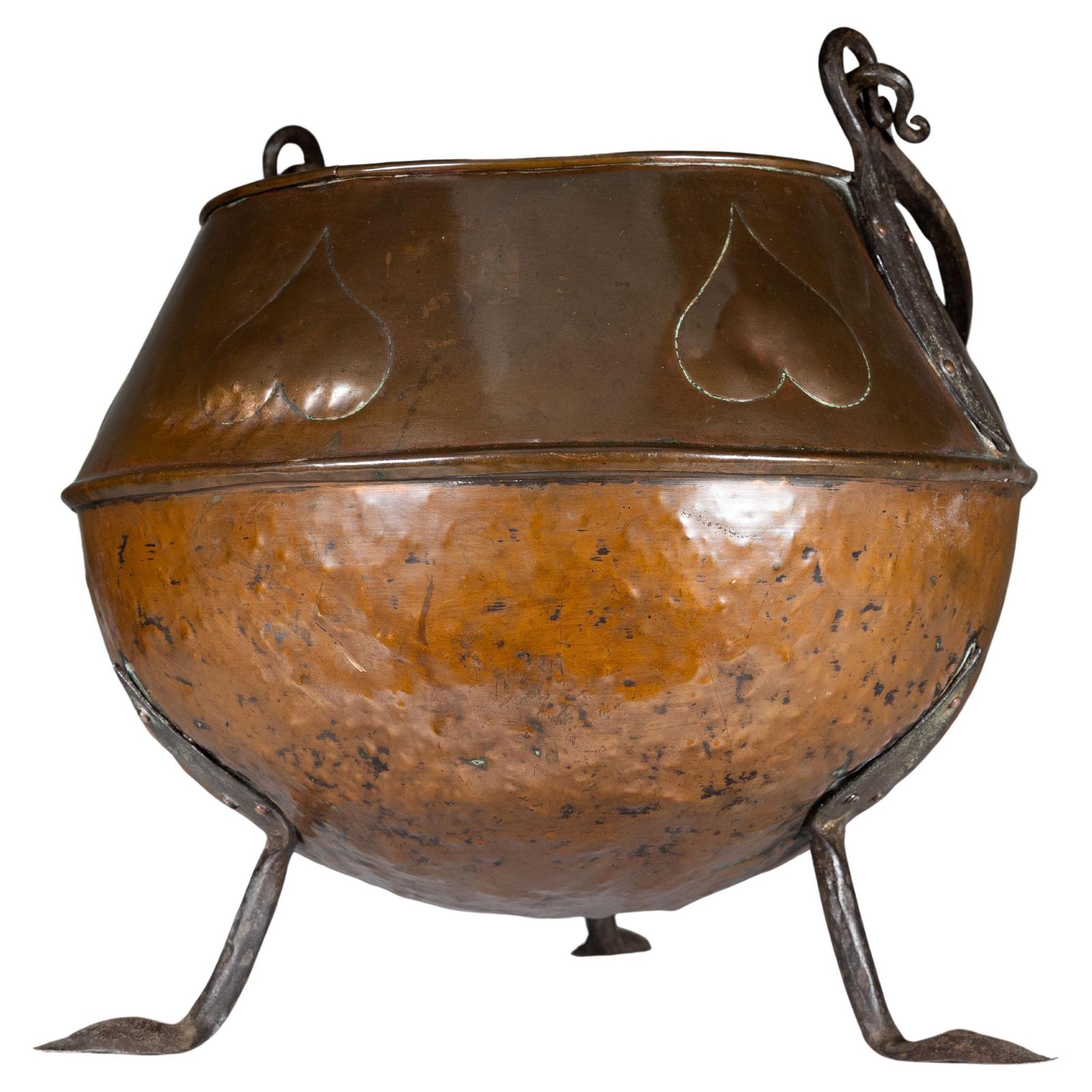 An Arts And Crafts Copper Coal Bucket With Stylized Heart Decoration