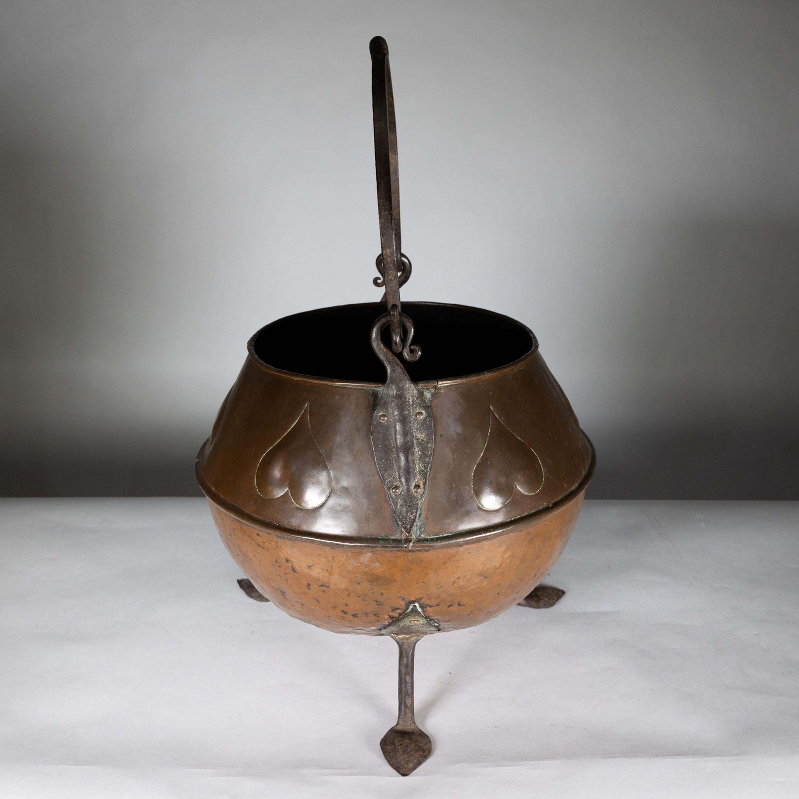 photo furniture An Arts And Crafts Copper Coal Bucket With Stylized Heart Decoration