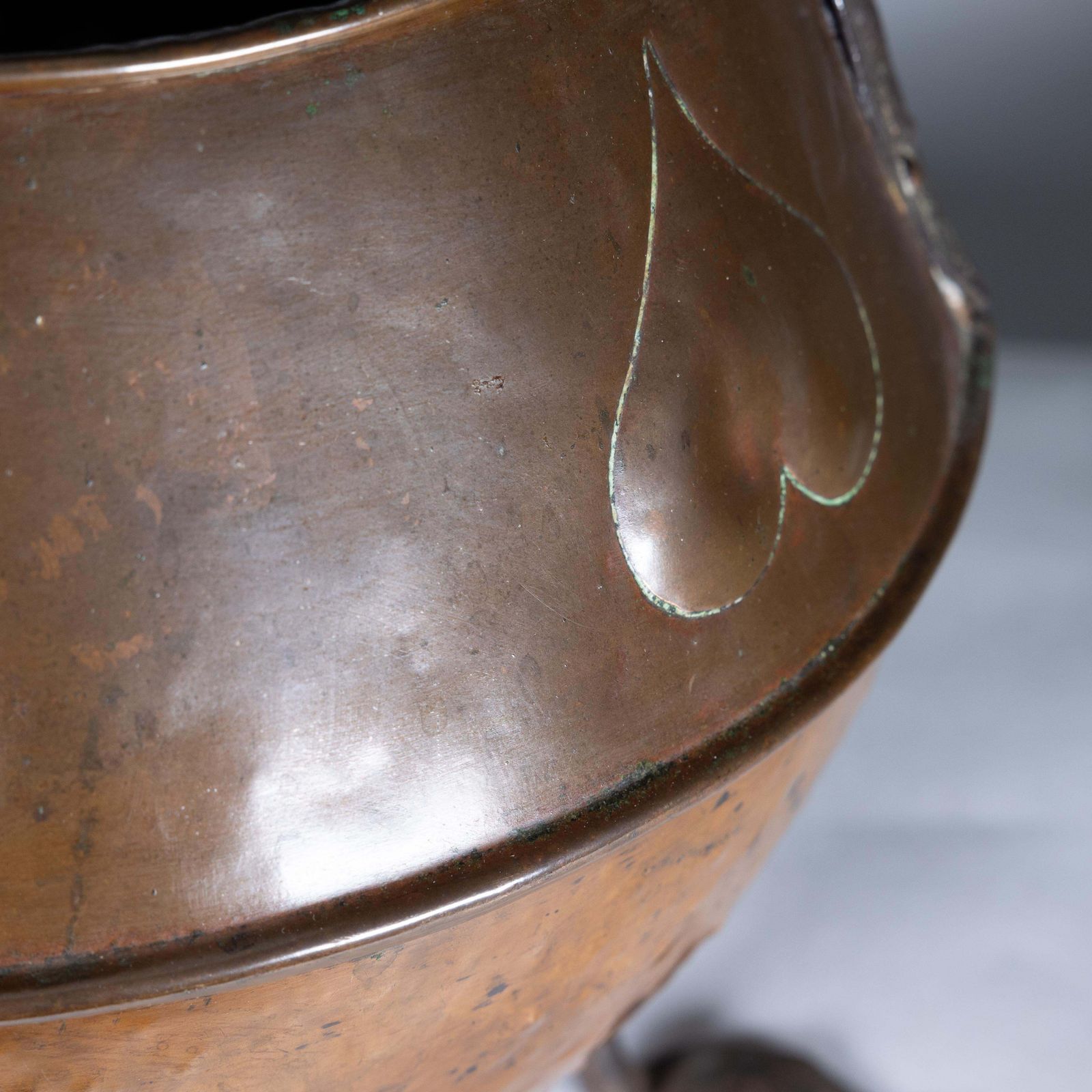 375.0 An Arts And Crafts Copper Coal Bucket With Stylized Heart Decoration photo