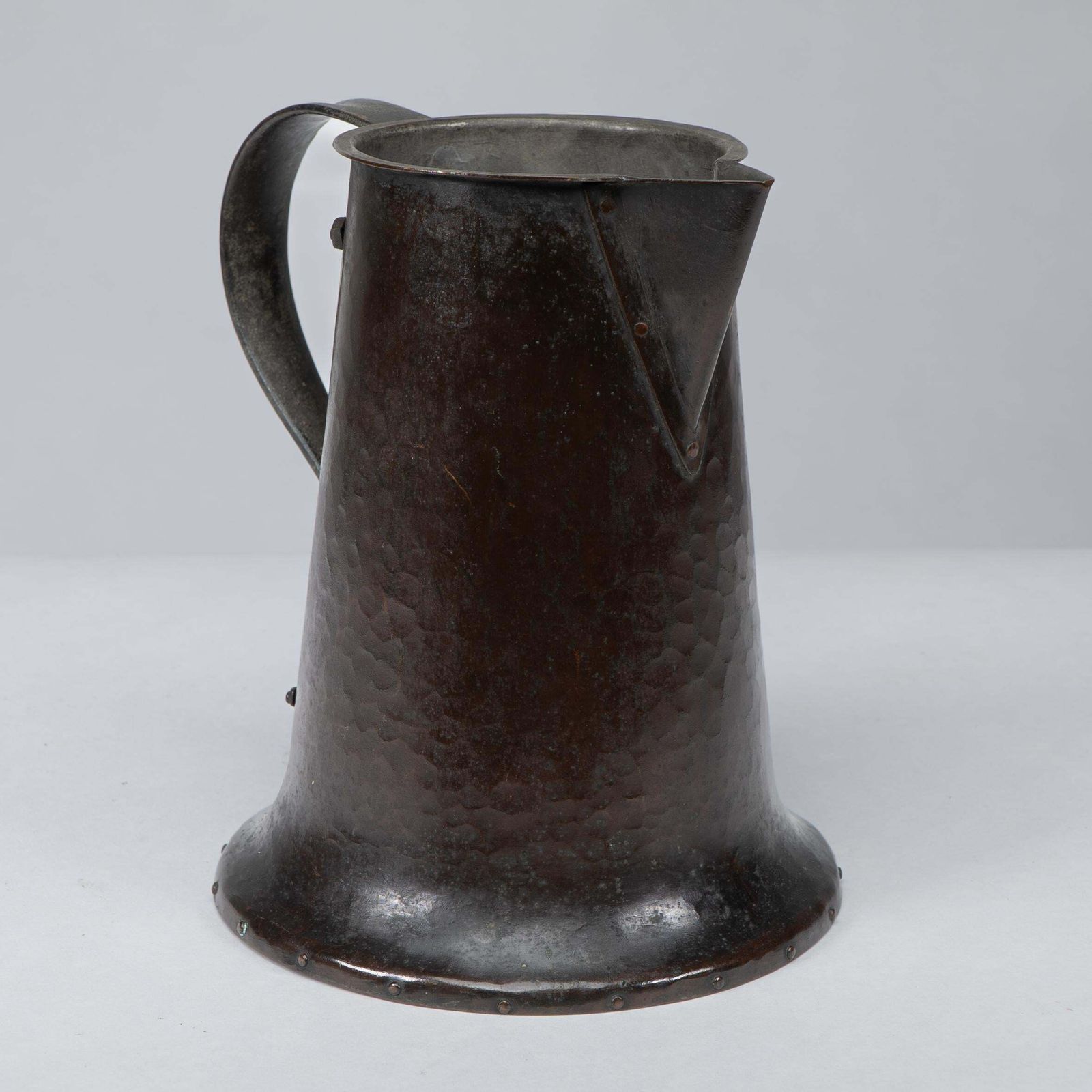 Arthur Dixon For The Bgh. An Arts & Crafts Hand Hammered Copper Jug photo for sale
