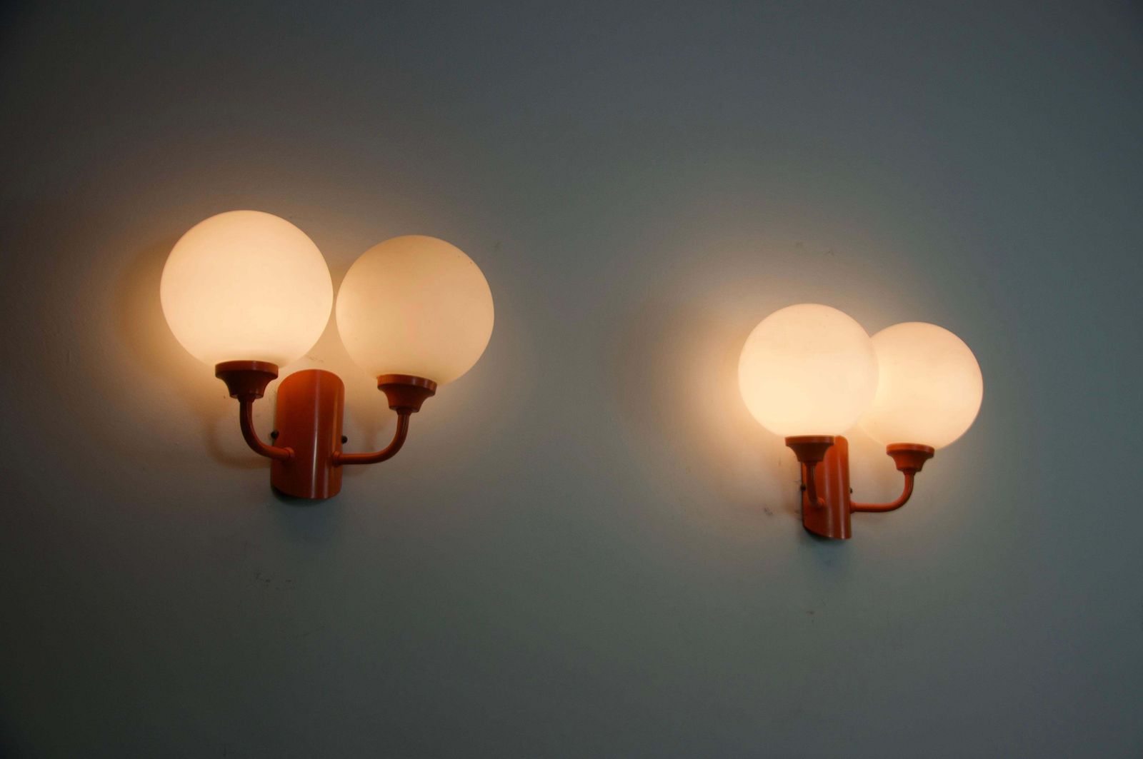 Pair Of Orange Metal And Opaline Glass Wall Lamps, Germany, 1960s photo for sale