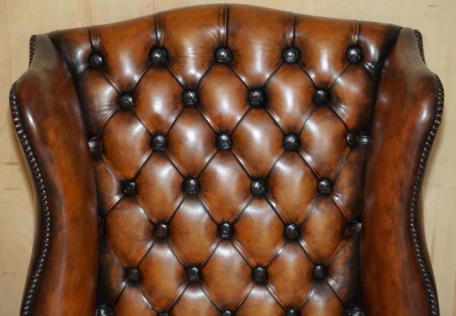 Comfortable Restored Whiskey Brown Leather Tufted Chesterfield Wingback Armchair photo vinterior