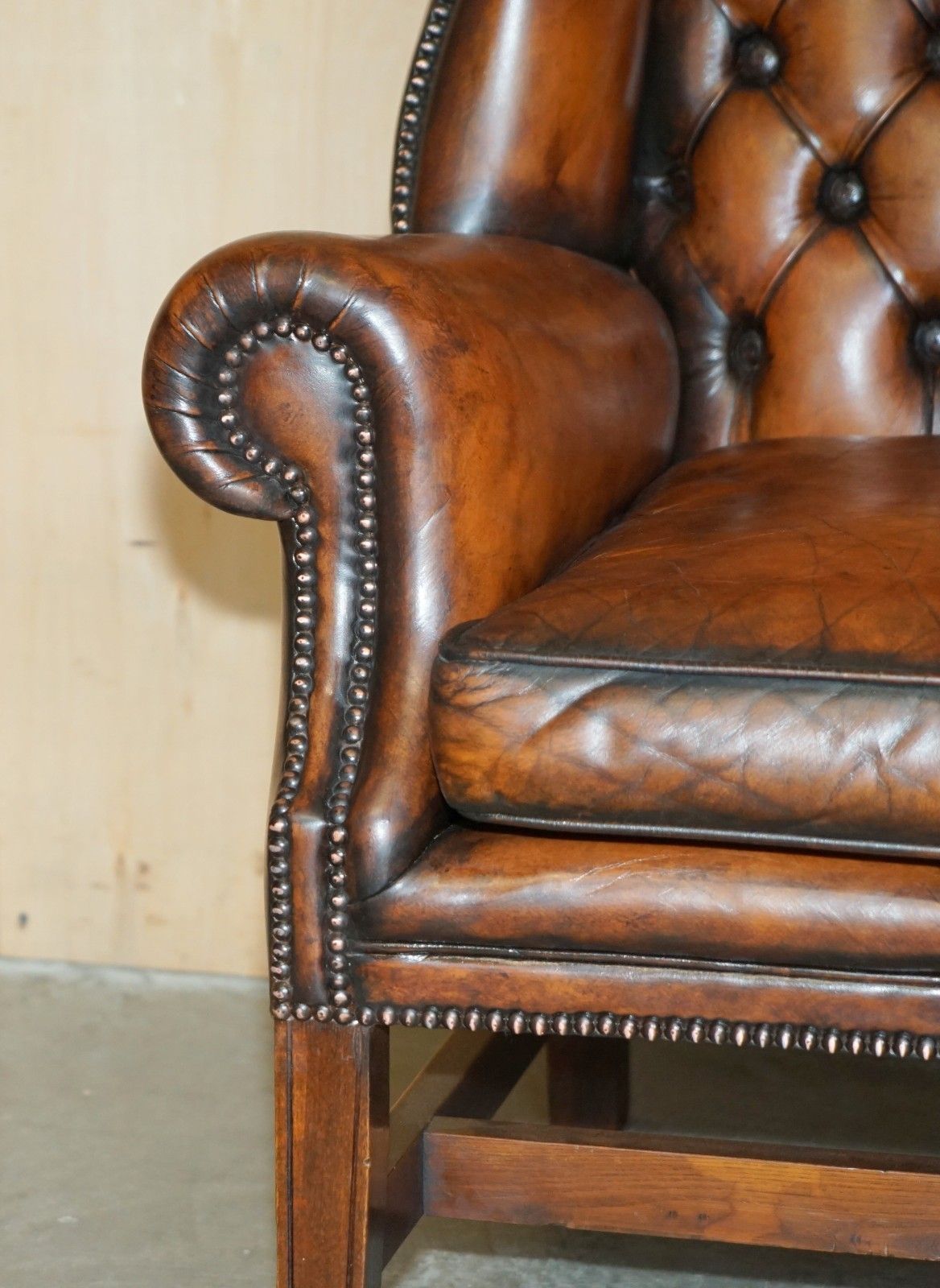 Furniture Comfortable Restored Whiskey Brown Leather Tufted Chesterfield Wingback Armchair photo