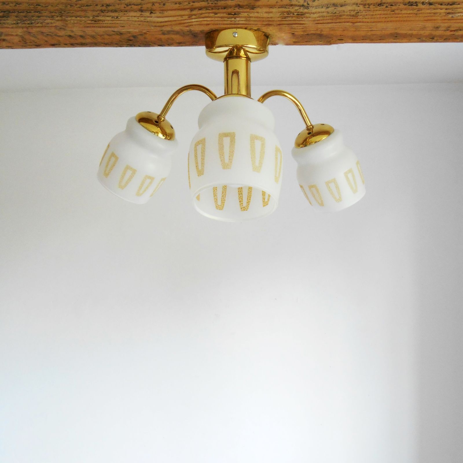 A Mid Century Modern Three Armed Brass Chandelier With Frosted Glass Shades photo buy