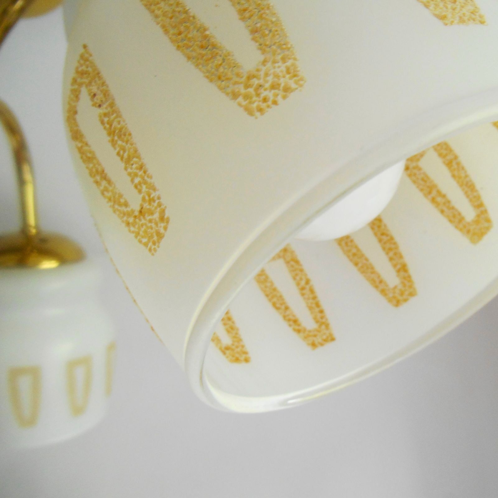 photo vinterior A Mid Century Modern Three Armed Brass Chandelier With Frosted Glass Shades