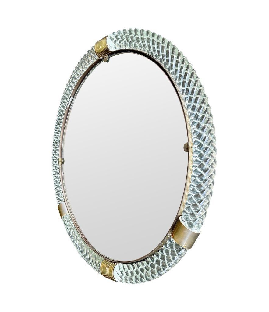 photo vintage A Large 1940s Circular Murano Glass And Brass Mirror By Barovier And Toso