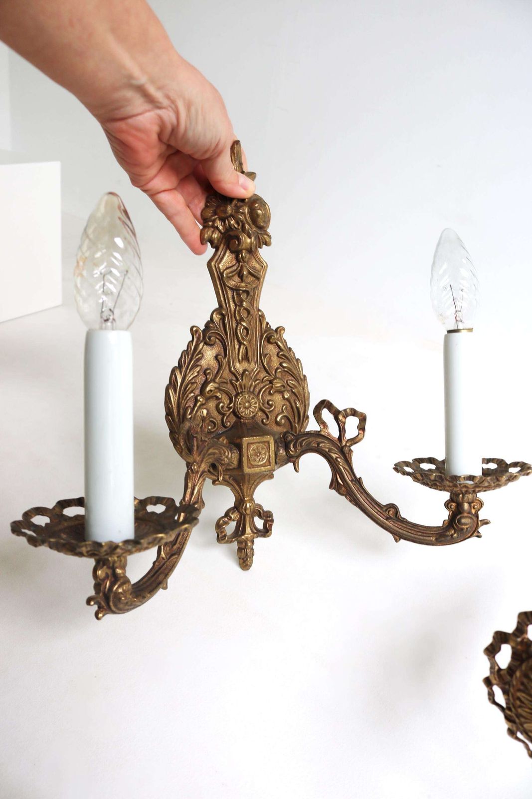 photo furniture Vintage Pair Of French Brass Wall Sconces With Ribbon And Floral Design, 1960s