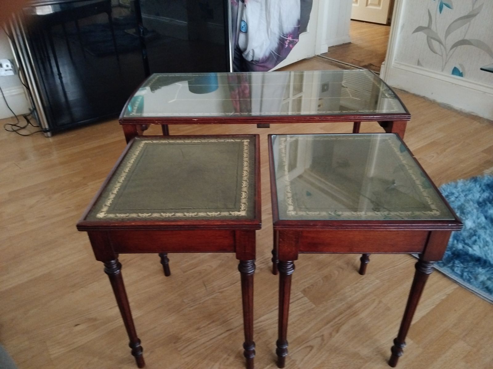 3 Piece Early 1900s Walnut Tables With Green Leather And Gold Inlay With Glass Tops