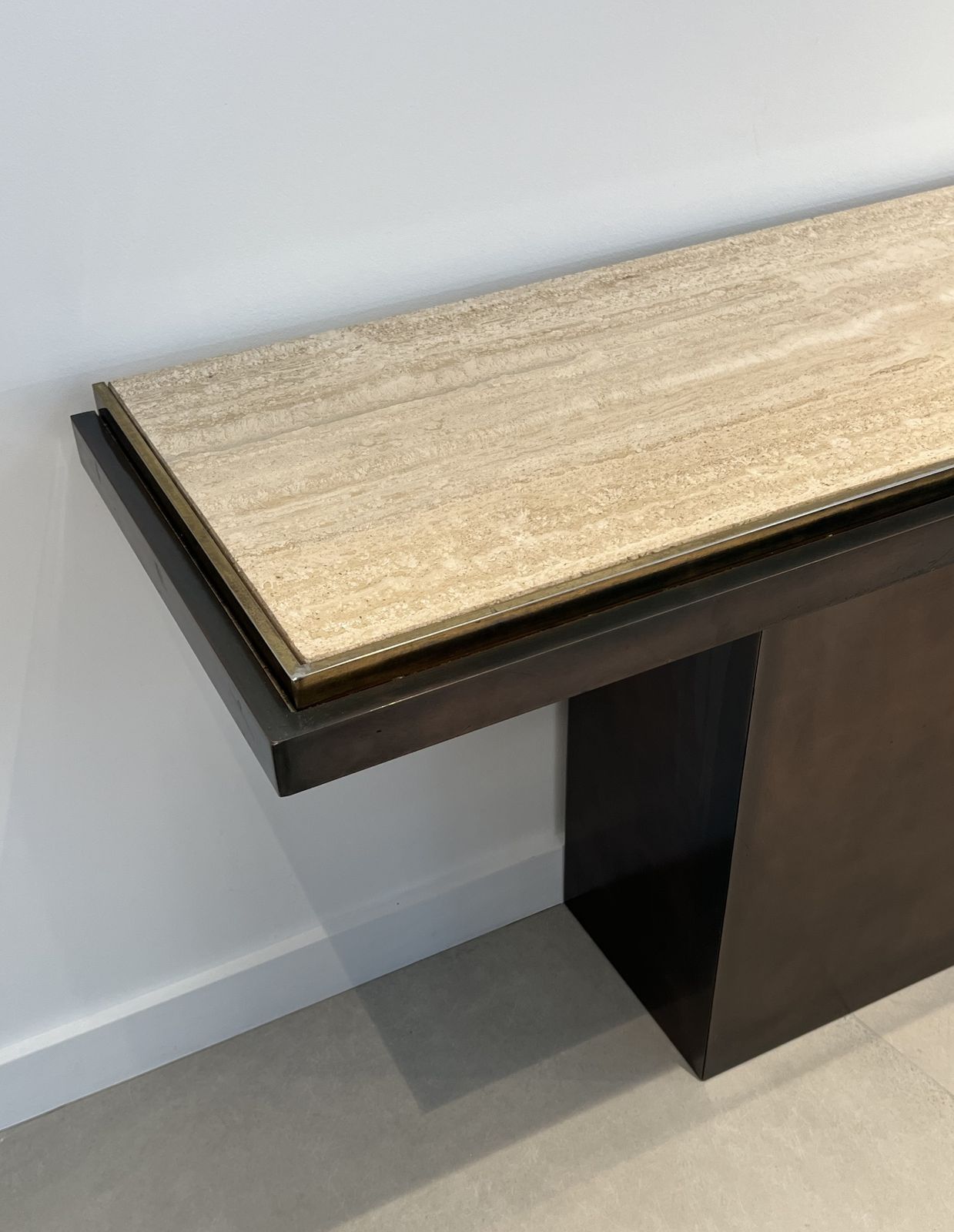 photo vintage Gunmetal Patina Console With Travertine Top. French Work. Circa 1970