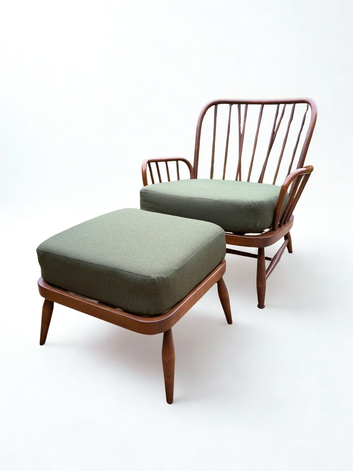 Ercol Jubilee Armchair And Model 205 Footstool With Custom Upholstery