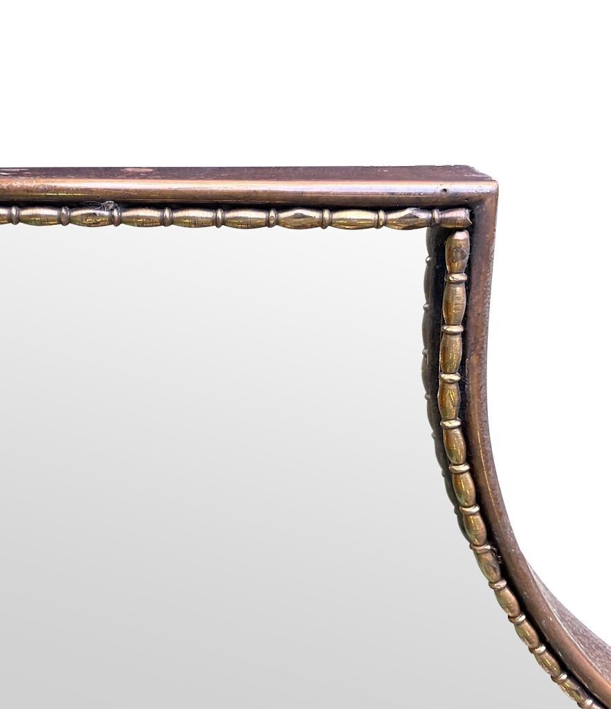 An Orignal Italian 1960s Brass Shield Mirror With Beaded Inner Frame Detail photo for sale
